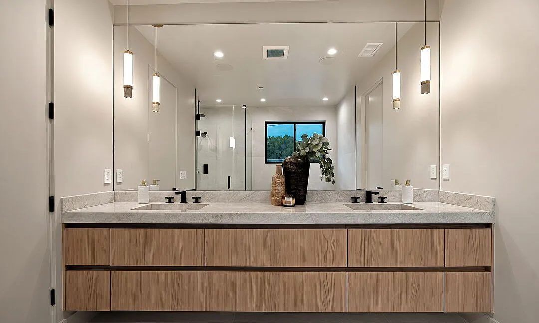 Primary bath with floating white oak double vanity