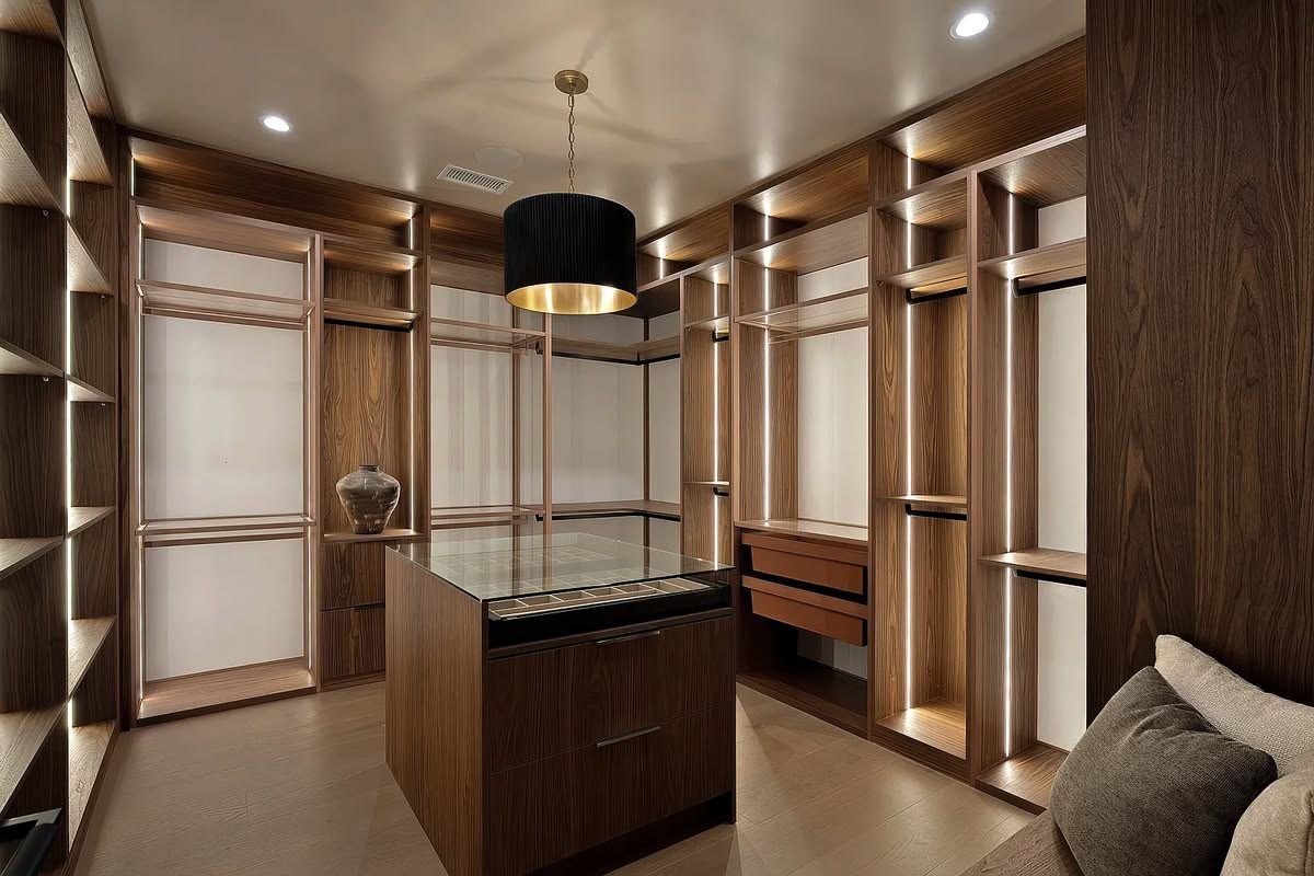 Walnut walk-in closet with integrated LED lighting