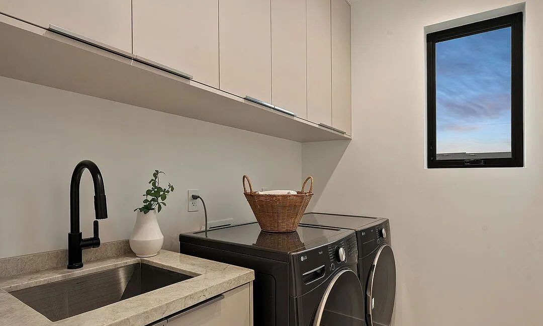 Laundry room with custom cabinetry