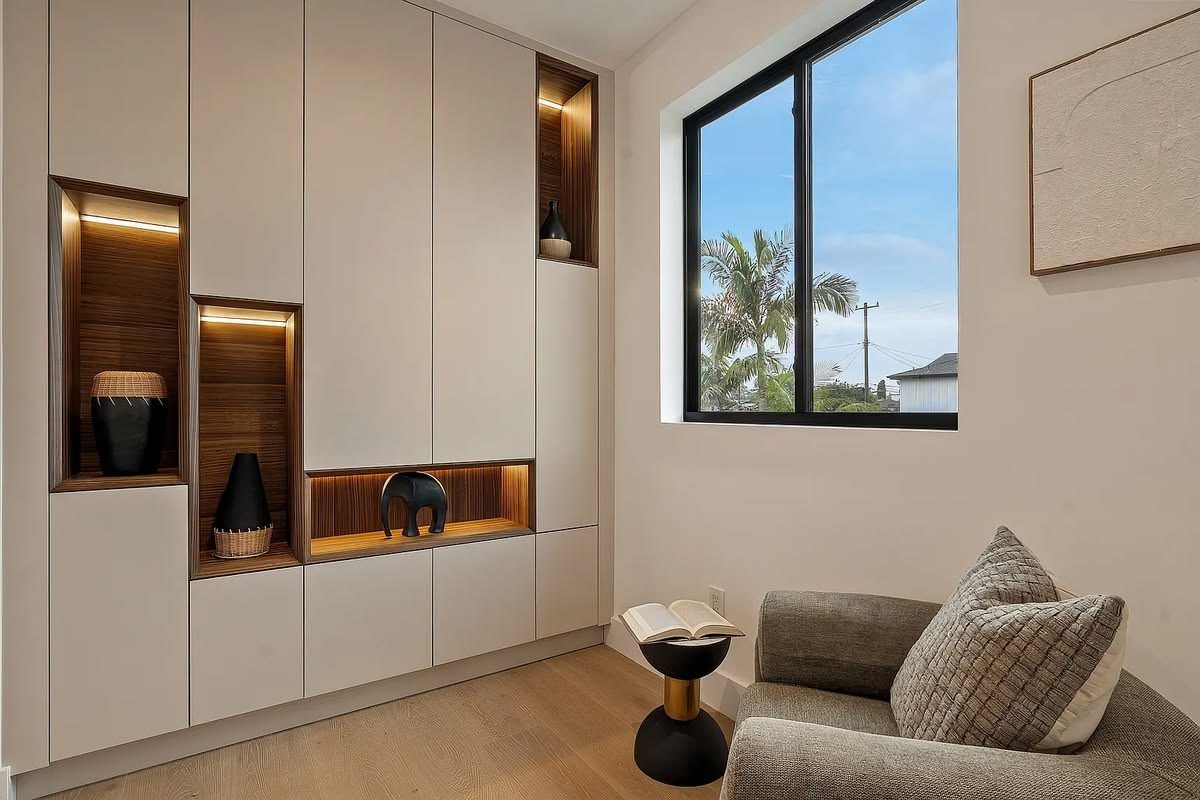 Built-in cabinetry with walnut display niches